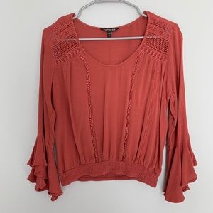 Express crochet top with bell sleeves